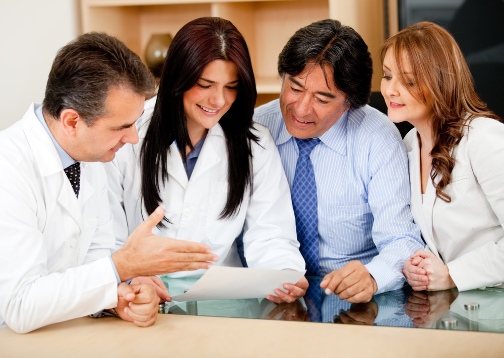 Group of business people in meeting with doctors offering medical insurance